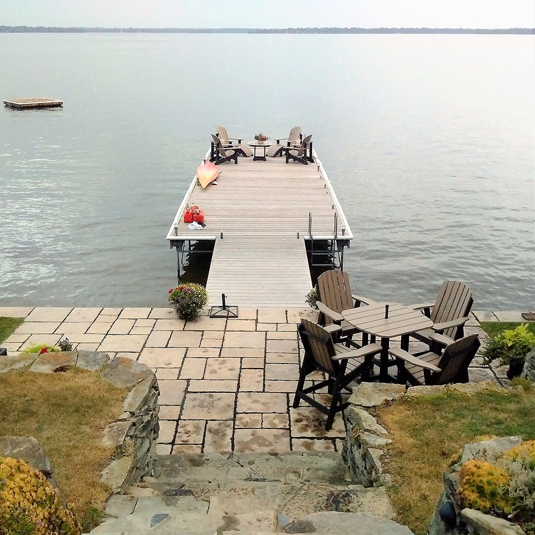Krahn dining and patio sets on the dock by the lake 
